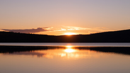 Fototapeta na wymiar Beautiful sunset on the lake Touladi in the Temiscouata national park, Canada