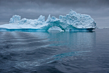 Iceberg arch in Disko Bay, Ilulissat, West Greenland
