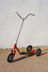 Red metallic vintage tricycle scooter