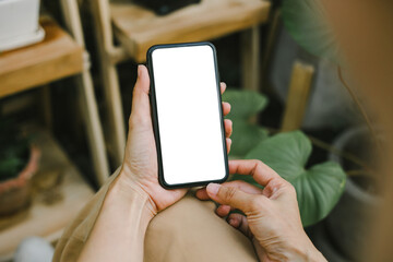 cell phone blank white screen mockup.woman hand holding texting using mobile on desk at office.background empty space for advertise.work people contact marketing business,technology