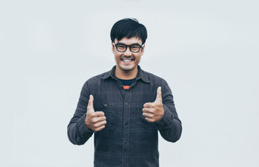 Fototapeta premium adult asian man.young male wear eye glasses.posing smiling look excited surprised thinking positive happy joy life.empty,copy space for text advertising.white background.attractive fashion people