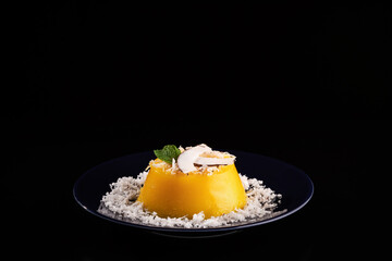 Brazilian sweet quindim based on eggs and coconut