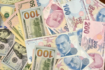Turkish lira and American dollar bills. Turkish lira plunges, crashing. Turkey's lira crisis. Turkish lira is going down.
