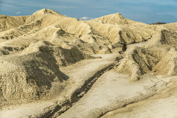 Desert rock formations captured in the mud volcanoes park in Romania