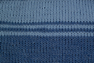 Blue knitted texture with stripes