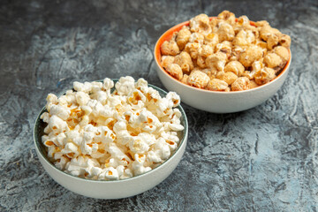 front view fresh popcorn for movie on light floor snack rusk cips