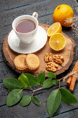 top view cup of tea with fruits and cookies on dark desk ceremony sweet biscuits sugar