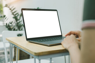 computer screen blank mockup.hand woman work using laptop with white background for advertising,contact business search information on desk at coffee shop.marketing and creative design