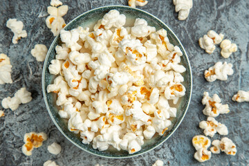 top view fresh popcorn on a light background snack rusk cips
