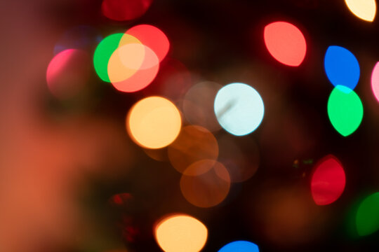 Abstract image of  Christmas lights blurred with bokeh.
