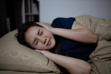 Young asian woman cannot sleep insomnia late at night. Can't sleep. Sleep apnea or stress. Sleep disorder concept.