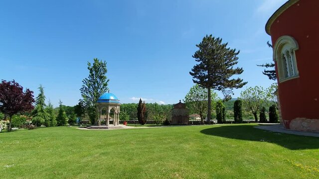 Zica Orthodox Monastery, Kraljevo, Serbia. Panoramic View of Garden and Landmark From 13th Century on Sunny Summer Day