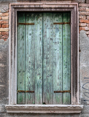Weathered Green Wood Door of Venice