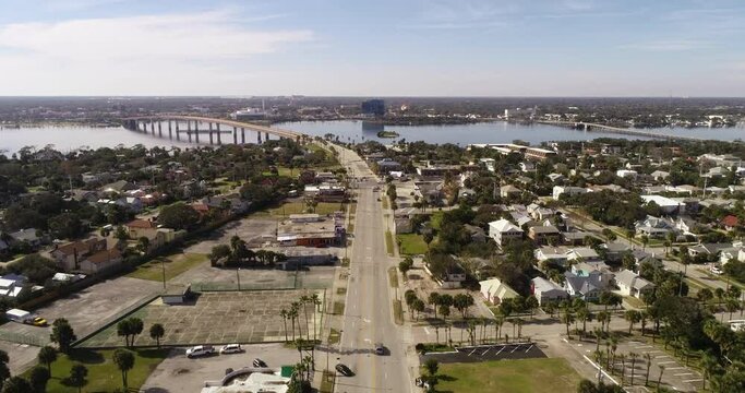 "Daytona Beach, FL USA - 12-10-2020: Cinematic aerial video of the International Speedway Blvd Bridge in Daytona Beach."