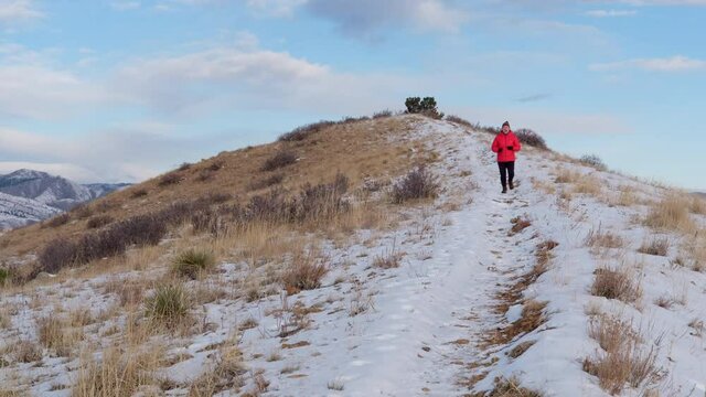 morning trail running at foothills of Rocky Mountains - Horsetooth Reservoir in northern Colorado in winter scenery