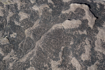 Close up of multicolor rock, purple and black, as a nature background
