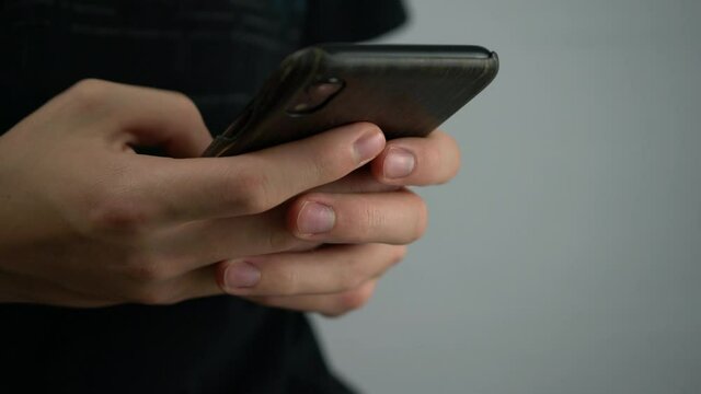 User texting and sending sms text message on mobile device