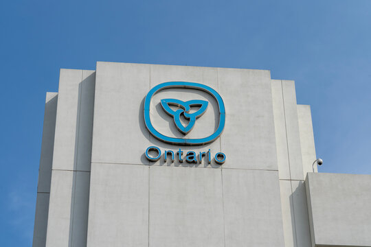 Oshawa, Ontario, Canada - September 26, 2020: Ontario government sign and logo on the Ontario Ministry of Finance building in Oshawa, Ontario, Canada on September 26, 2020. 