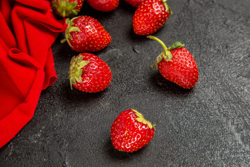 front view fresh red strawberries on dark background ripe fruit berry