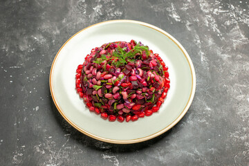 front view vinaigrette salad with pomegranates and beans on dark background food health salad