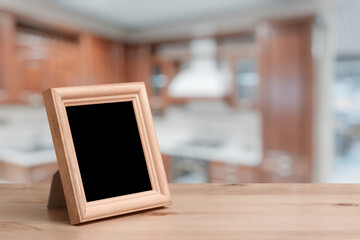 photo frame on the wooden table