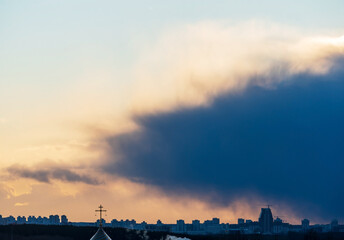 Fototapeta premium Sunset at city with building silhouette