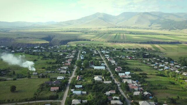 Aerial view of Farmlands and Mountains