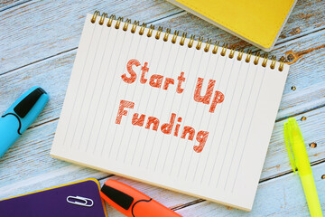 Conceptual photo about Start Up Funding with handwritten phrase.