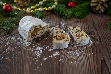 Traditional Christmas Shtollen Cake on a wood background.