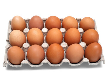 Brown raw chicken eggs in a cardboard box for eggs.Food background.