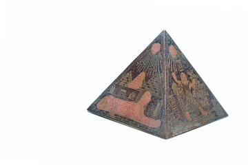 View of souvenir pyramid from Egypt isolated on white background.