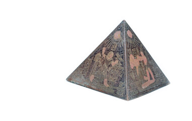 Figurine of egyptian pyramid isolate on white background.
