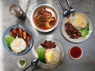 Top view home-cooked Asian Chinese food. Malaysian traditional home-cooked meal.