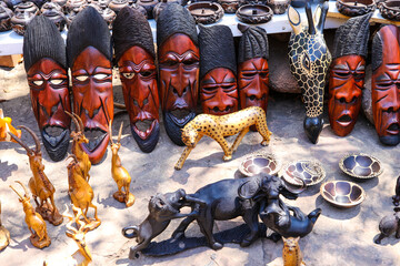 Local souvenirs on display at the street market near Victoria Falls National Park entrance on the Zimbabwe side 