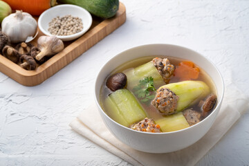 Stuffed Cucumber with minced pork soup (Gang Jued Tang Gwa Yad Sai) ,Clear soup combined with cucumber filled with marinated minced pork shiitake and carrot.