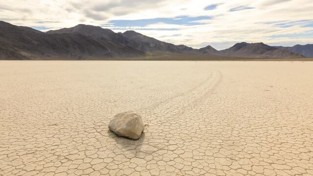 Time lapse of the clouds above the famous moving rocks in Death Valley