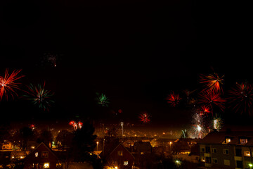 City skyline with fireworks on a dark sky
