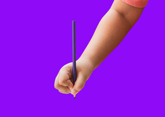 Children hand holding a purple pencil on a isolated background.