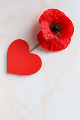Obraz na płótnie Canvas happy valentine's day greeting card mockup. red heart, flowers and envelope