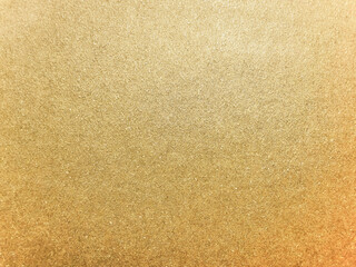Gold paper texture background. Flat lay.