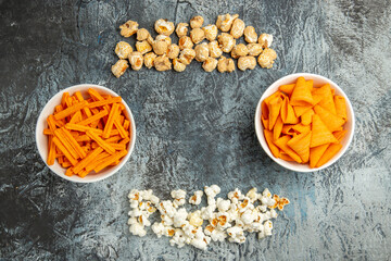 top view fresh popcorn with rusks and cips on light background cinema movie snack cips