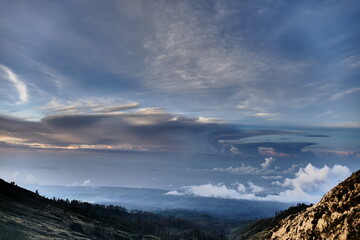 Sunrise view from the summit of Mount Rinjani. In the background is the Island of Sumbawa and Mount Tambora