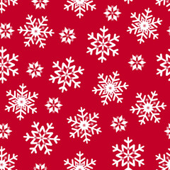 Naklejka na ściany i meble Christmas seamless pattern white snowflakes on red background