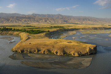 View of the Zeravshan river valley near Panjakent in Sughd province, Tajikistan before sunset