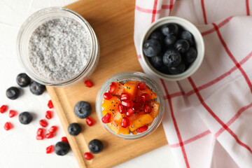Concept of breakfast with delicious chia pudding with fruits
