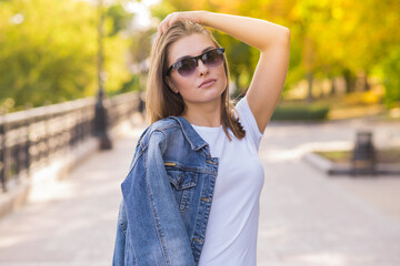 Portrait of a young, happy and pretty blonde girl