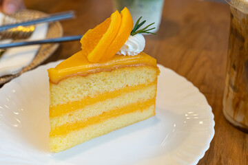Orange cake is a sponge cake. With orange slides on top