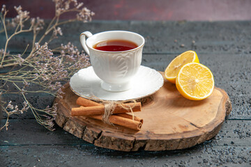 front view cup of tea with lemon on dark background ceremony photo