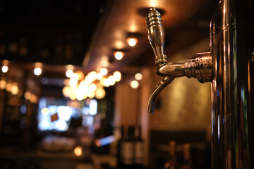 Close-up of a beer tap at pub.