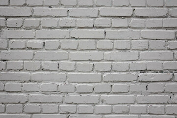 the grey masonry wall of the house pattern